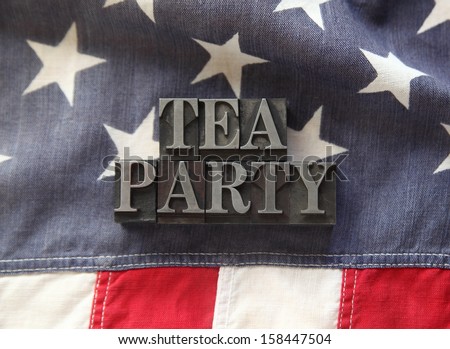 fabric USA flag with letterpress lead type words \'tea party\'