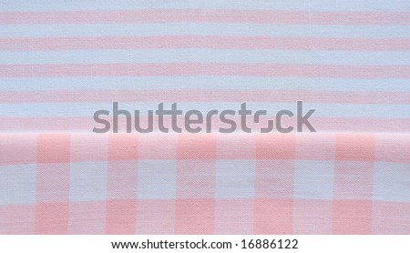 orange and white fabric in stripes and checks