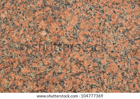 Granite stone is treated and photographed close-up.