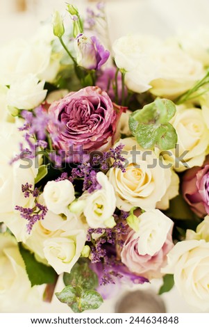 wedding bouquet with white and purple flowers