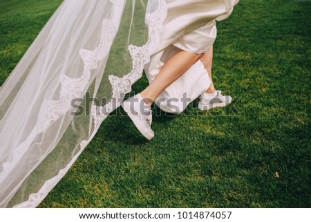 Similar – Image, Stock Photo Wedding dress with sneakers