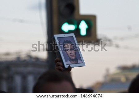 MOSCOW - JULY 18: People express support to the Alexey Navalny after his arrest on July 18, 2013 in Moscow, Russian Federation. People are protesting the political repressions in Russia.