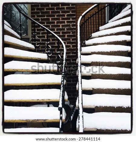 Staircases covered by snow. Winter in Montreal, Canada.