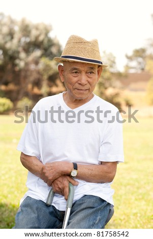 old man with walking stick