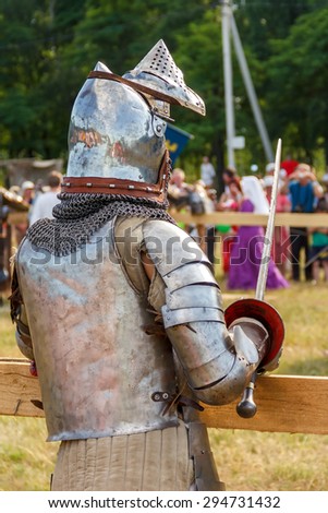 Vileyka, Belarus - July 4: Historical medieval festival honor ancestors Knight looking on the field2015