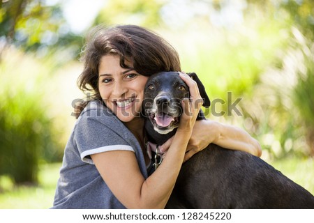 Similar – Image, Stock Photo Tree cuddling | woman hugging a pine trunk