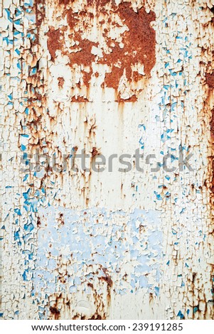 Background texture of chipped, peeling and rusted paint on metal