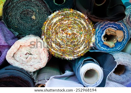 rolls of old colored tissue on stock market
