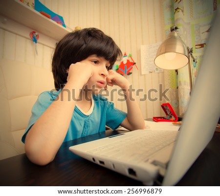 distance learning, a boy with computer. instagram image retro style