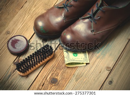 service. Shoe Shine for money. boots, brush, shoe polish and dollar. instagram image retro style