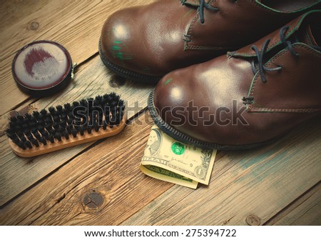 boots, brush, shoe polish and dollar. service. Shoe Shine for money. instagram image retro style
