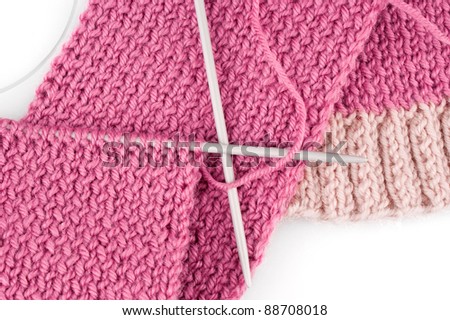 Knitting scarf on white background