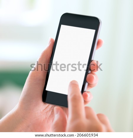 Female hands holding and touching on modern mobile smart phone with blank screen. Isolated on white background.