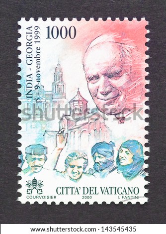 VATICAN CITY - CIRCA 2000: a postage stamp printed in Vatican City to commemorate pope John Paul II travel to India, circa 2000.