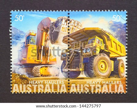 AUSTRALIA - CIRCA 2008: two postage stamps printed in Australia showing an image of an iron ore mining, circa 2008.