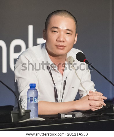 BARCELONA - JUNE 27: Dong Nguyen developer of Flappy Bird mobile game at the Gamelab Barcelona 2014 on June 27, 2014, Barcelona, Spain.