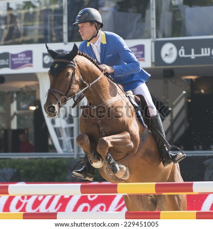 BARCELONA - OCTOBER 09: Christian Ahlmann rider in action during the CSIO Coca-Cola Trophy in Real Club Polo Barcelona, on October 09, 2014, Barcelona, Spain.