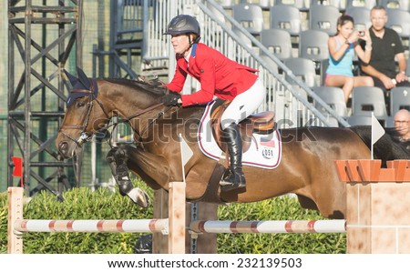 BARCELONA - OCTOBER 09: Lauren Hough rider in action during the Furusiyya Jumping First Competition in Real Club Polo Barcelona, on October 09, 2014, Barcelona, Spain.