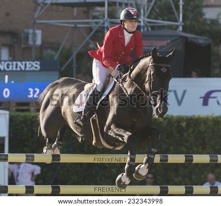 BARCELONA - OCTOBER 09: Tiffany Foster rider in action during the Furusiyya Jumping First Competition in Real Club Polo Barcelona, on October 09, 2014, Barcelona, Spain.