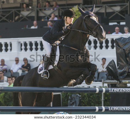 BARCELONA - OCTOBER 09: Edwina Tops-Alexander rider in action during the Furusiyya Jumping First Competition in Real Club Polo Barcelona, on October 09, 2014, Barcelona, Spain.