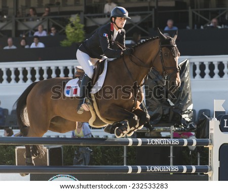 BARCELONA - OCTOBER 09: Penelope Leprevost rider in action during the Furusiyya Jumping First Competition in Real Club Polo Barcelona, on October 09, 2014, Barcelona, Spain.