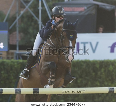 BARCELONA - OCTOBER 09: Malin Baryard-Johnsson rider in action during the Furusiyya Jumping First Competition in Real Club Polo Barcelona, on October 09, 2014, Barcelona, Spain.