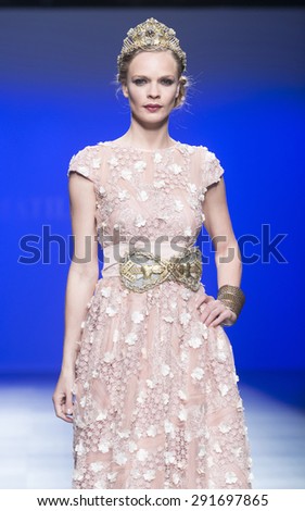 BARCELONA - MAY 07: a model walks on the Matilde Cano bridal collection 2016 catwalk during the Barcelona Bridal Week runway on May 07, 2015 in Barcelona, Spain.