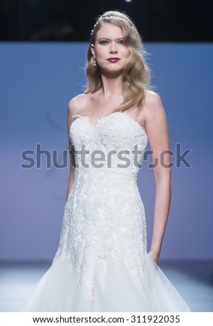BARCELONA - MAY 08: a model walks on the Justin Alexander bridal collection 2016 catwalk during the Barcelona Bridal Week runway on May 08, 2015 in Barcelona, Spain.