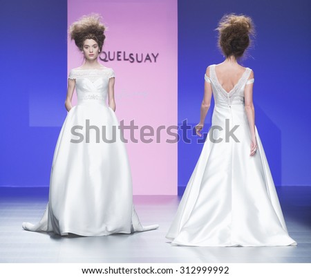BARCELONA - MAY 06: models walking on the Miquel Suay bridal collection 2016 catwalk during the Barcelona Bridal Week runway on May 06, 2015 in Barcelona, Spain.