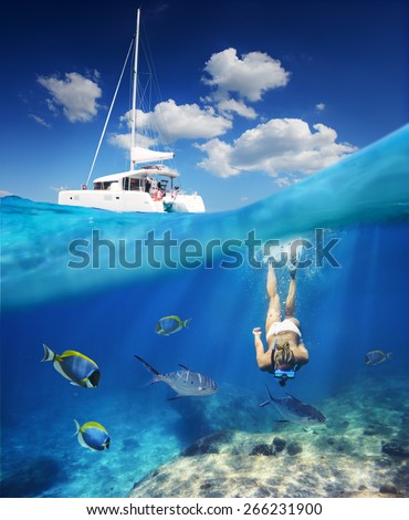 Similar – Image, Stock Photo Young woman in diving mask swimming underwater