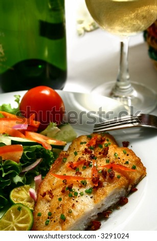 fish steak fillet with fresh garden salad