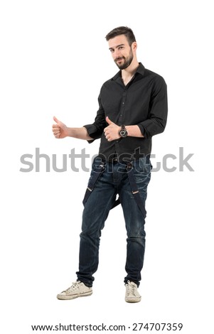 Smiling friendly young male fashion model with thumbs up. Full body length portrait isolated over white background.