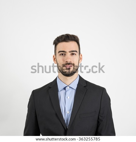 Head And Shoulder Front Portrait Of Young Man In Suit And Blue Shirt ...