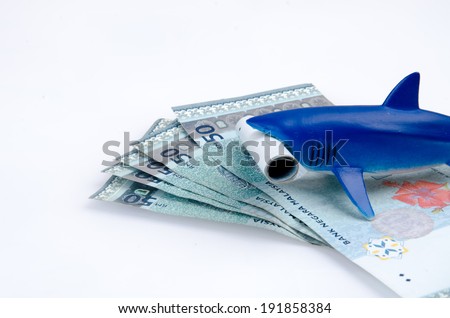 Toy shark bite money, a concept of loan shark