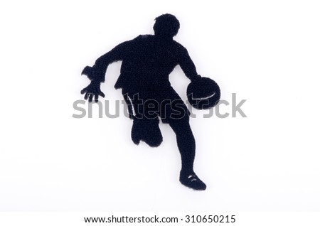 Man bounce the ball made from carpet fabric over white background