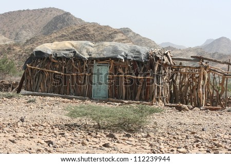 In the desert of Ethiopia, AFrica, nomads make temporary huts from whatever wood they can find.