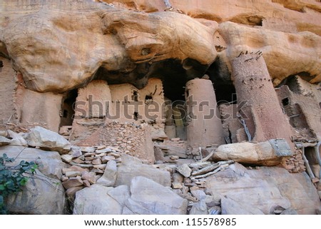 Mud ruins of an ancient city of the Dogon people are a  common site in the Bandiagara Escarpment of Mali, AFrica,