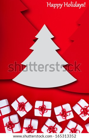 Christmas and holidays greeting with presents on red surface, copy space