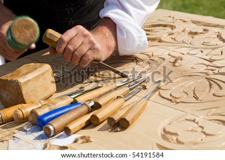 Similar – Foto Bild Handwerker schnitzt Holz in der Werkstatt