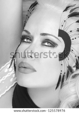 Beautiful Image Of Fashion Model with Feathers