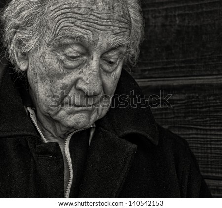Outdoor Portrait of a senior man with Sadness