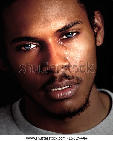 Beautiful Image of a young Black man crying