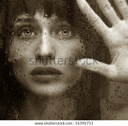 Beautiful Woman caught on the outside in The Rain