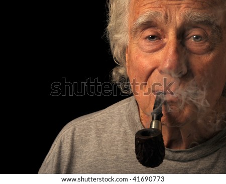 Very Nice Portrait Image of a senior man Smoking a pipe