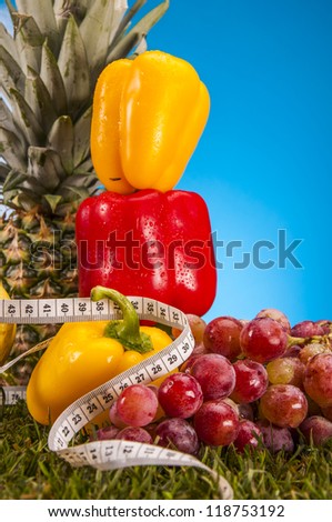 Fitness theme with healthy food with light background