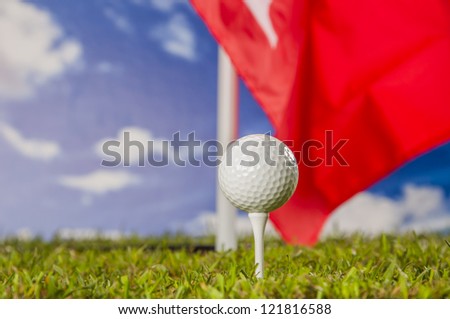Golf equipment on green grass, golf field