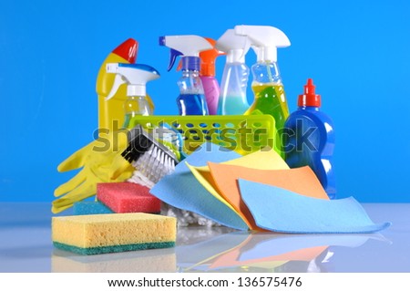 Cleaning concept with bottles and brushes