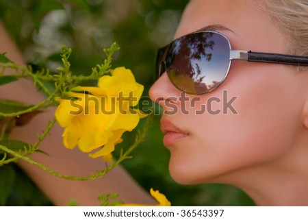 Closeup flowers and girl, summer outdoor shot