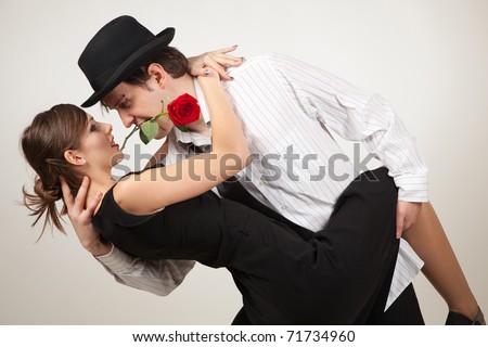 Dance with passion, two people and rose