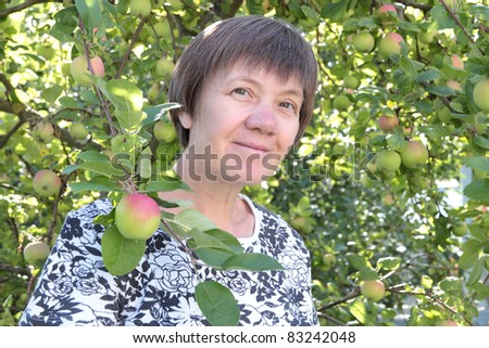 middle-aged woman in the garden,joy to the soul.